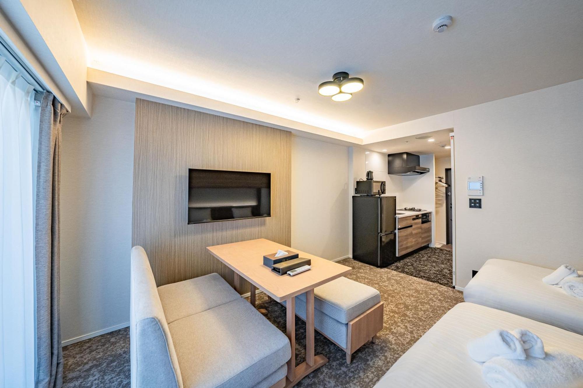 11 Shinsekai Apartemen *